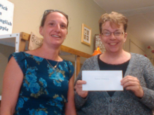 Sally accepts cheque for Radikal